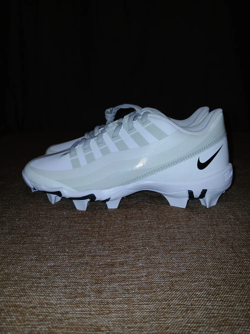 Nike Young Size Y5 Athletic Cleats with Subtle Gray Accents